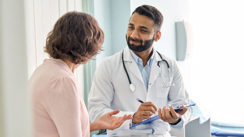 Doctor talking to patient